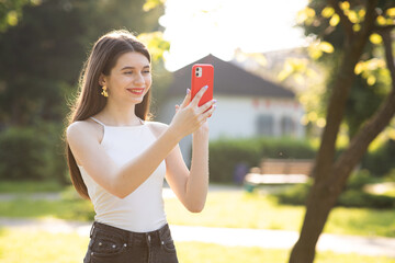 Girl vlogger waving hand speaking looking at camera webcam. Girl communicating with friend online make video call talking record lifestyle vlog distance job interview