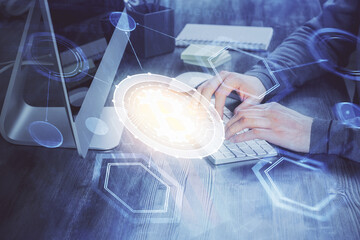 Blockchain theme hud with businessman working on computer on background. Concept of crypto chain. Multi exposure.