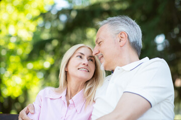 Fototapeta premium Happy couple sitting outdoors