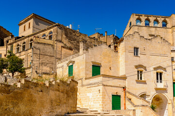 Fototapeta premium It's Street of Matera, Puglia, Italy. The Sassi and the Park of the Rupestrian Churches of Matera. UNESCO World Heritage site