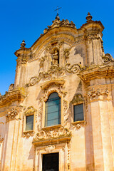 Fototapeta na wymiar It's Church of Matera, Puglia, Italy. The Sassi and the Park of the Rupestrian Churches of Matera. UNESCO World Heritage site