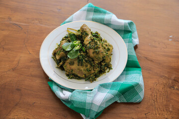 Photo of spicy chicken food with green chili seasoning