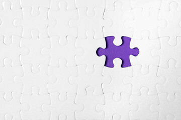 Blank white puzzle with missing piece on purple background, top view. Space for text