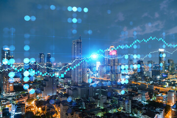 Night time view cityscape of Bangkok city background with financial graph. Success and finance concept. Multiexposure