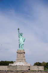 Fototapeta na wymiar The Statue of Liberty at Liberty Island in New York City on a sunny day