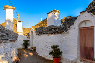 It's Alberobello, a small town in Apulia, Italy. Famous for its unique trulli buildings. The Trulli of Alberobello have are a UNESCO World Heritage site since 1996