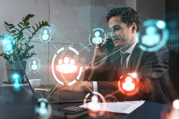 Businessman in office working with laptop, develop networking chain to push new social media project, typing computer. Double exposure.