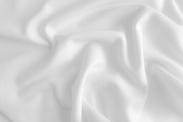 Folded white clothes background, fabric texture