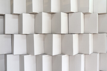 stack of white boxes for background.