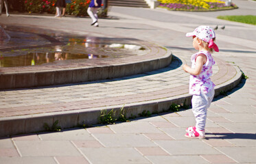 Children near a splashing fontain in the center of town 12 June 2016 Pyatigorsk, Russia, Town Square