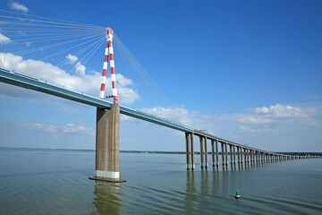 View of the Saint-Nazaire Bridge which is a cable-stayed bridge spanning the Loire River, linking Saint-Nazaire to Saint-Brevin-les-Pins, Loire-Atlantique, Pays de la Loire, France.