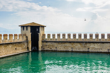 It's Wall of the Castello Scaligero di Sirmione (Sirmione Castle), built in XIV century, Lake Garda, Sirmione, Italy