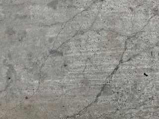 Old striped and cracked concrete floor texture background. Copy space.