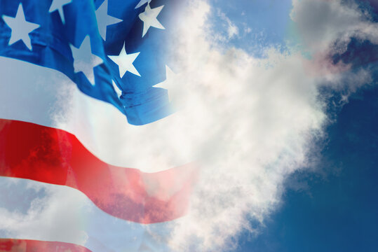 Double exposure USA flag on white clouds and blue sky background for 4 july independence day