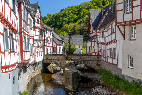 River elz with old bridge and half-timbered houses in Monreal