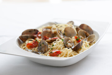 Pasta con almejas, comida italiana. Pasta with clams, Italian food.