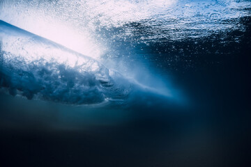 Ocean wave with vortex in underwater. Underwater view