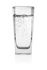 Glass of water with bubbles of gas isolated on white.