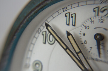 close up vintage alarm clock blue
