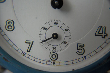 close up vintage alarm clock blue