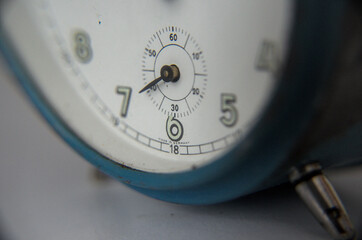 close up vintage alarm clock blue