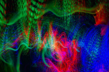 Long exposure for light painting photography. Red, green and blue rays