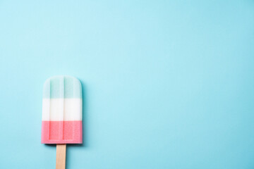 Sponge popsicle Pastel Color on blue pastel background.