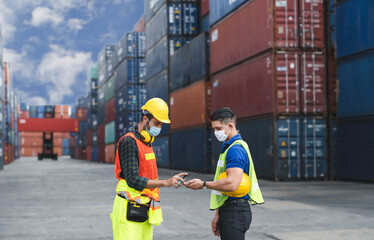 Engineer check fever hand cleaner of Employee before starting work and masked for protect virus before working in the industrial site.