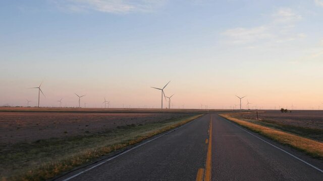 Driving POV through a wind farm