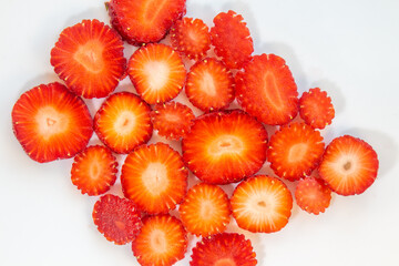 Appetizing slices of juicy strawberries.