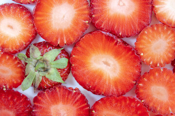 Appetizing slices of juicy strawberries.