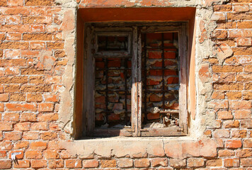 Window in old brick wall