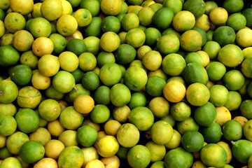 fresh limes in a market