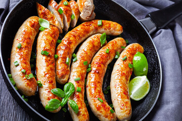 Long breakfast sausage links of pork meat