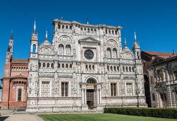 Fototapeta na wymiar The beautiful facade of the Certosa of Pavia