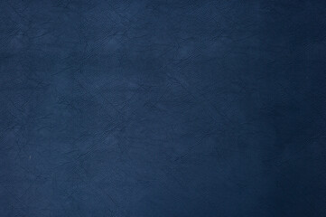 Background images of synthetic leather sheets used to cover the sofa.