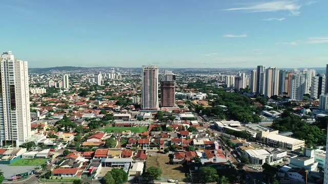 Aerial view of the city of Goi&acirc;nia, state of Goi&aacute;s, Brazil. City divided between an area full of buildings and others of residential houses. Concept of population growth increasing.