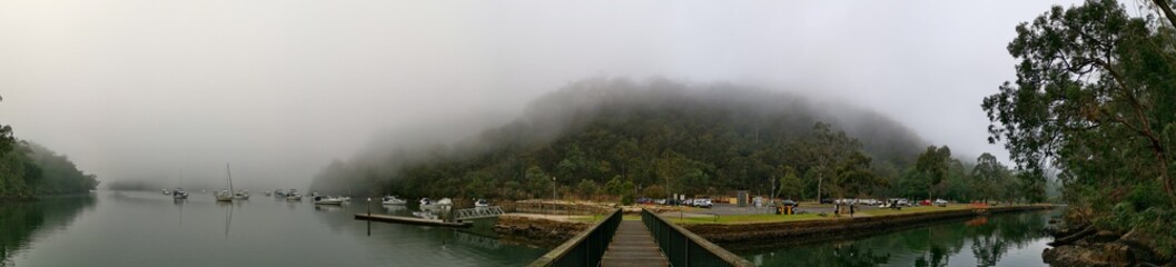 Beautiful morning foggy panoramic view of Apple Tree Creek, Ku-ring-gai Chase National Park, New South Wales, Australia