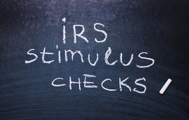 Irs stimulus checks is written in chalk