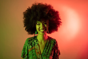 Portrait young beautiful multiethnic woman studio shot on colorful background - attitude, beauty, hairstyle concept