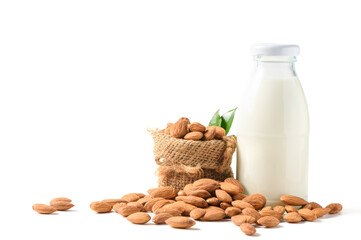 Bottle of milk and Almonds nuts with leaf isolated on white background,