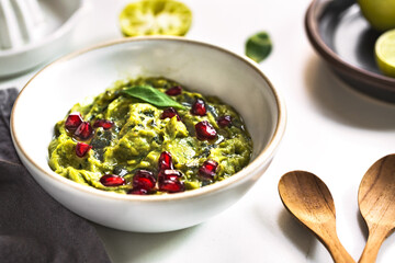 Avocado dip with Basil Olive oil and Pomegranate topping