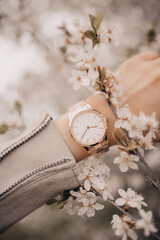Beautiful classic white watch on woman hand