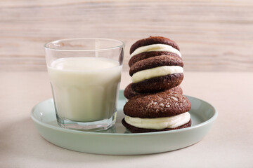 Chocolate sandwich cookies with cream filling, served