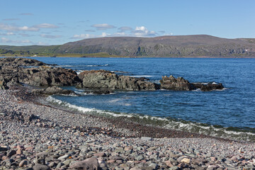 Pebble beaches on the coast of the Barents Sea, Varanger national scenic route, Finnmark, Norway
