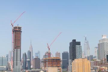 Skyscraper Construction in Long Island City Queens New York with the Manhattan Skyline in the Background