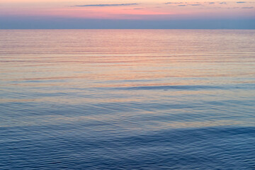 Naklejka na ściany i meble Dawn over the sea in the morning.