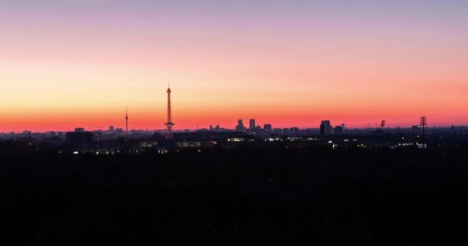 Colorful sunrise timelapse video of Berlin skyline with Berliner Funkturm and TV Tower