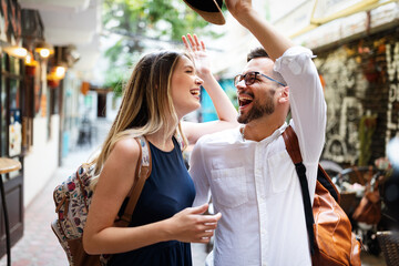 Happy tourist couple in love having fun, travel, smiling on vacation