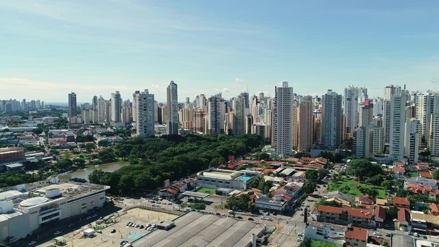 Aerial view of the city of Goi&acirc;nia, state of Goi&aacute;s, Brazil. City divided between an area full of buildings and others of residential houses. Concept of population growth increasing.